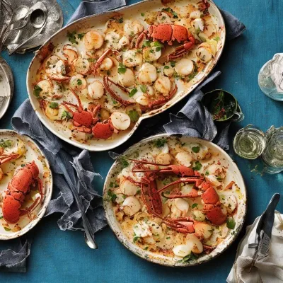 Gratineret hummer og kammuslinger